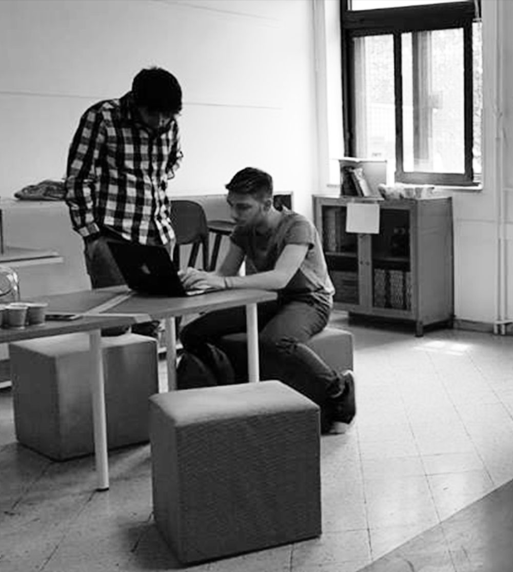 Alberto G. Valerio freelance Web Designer with a coworker